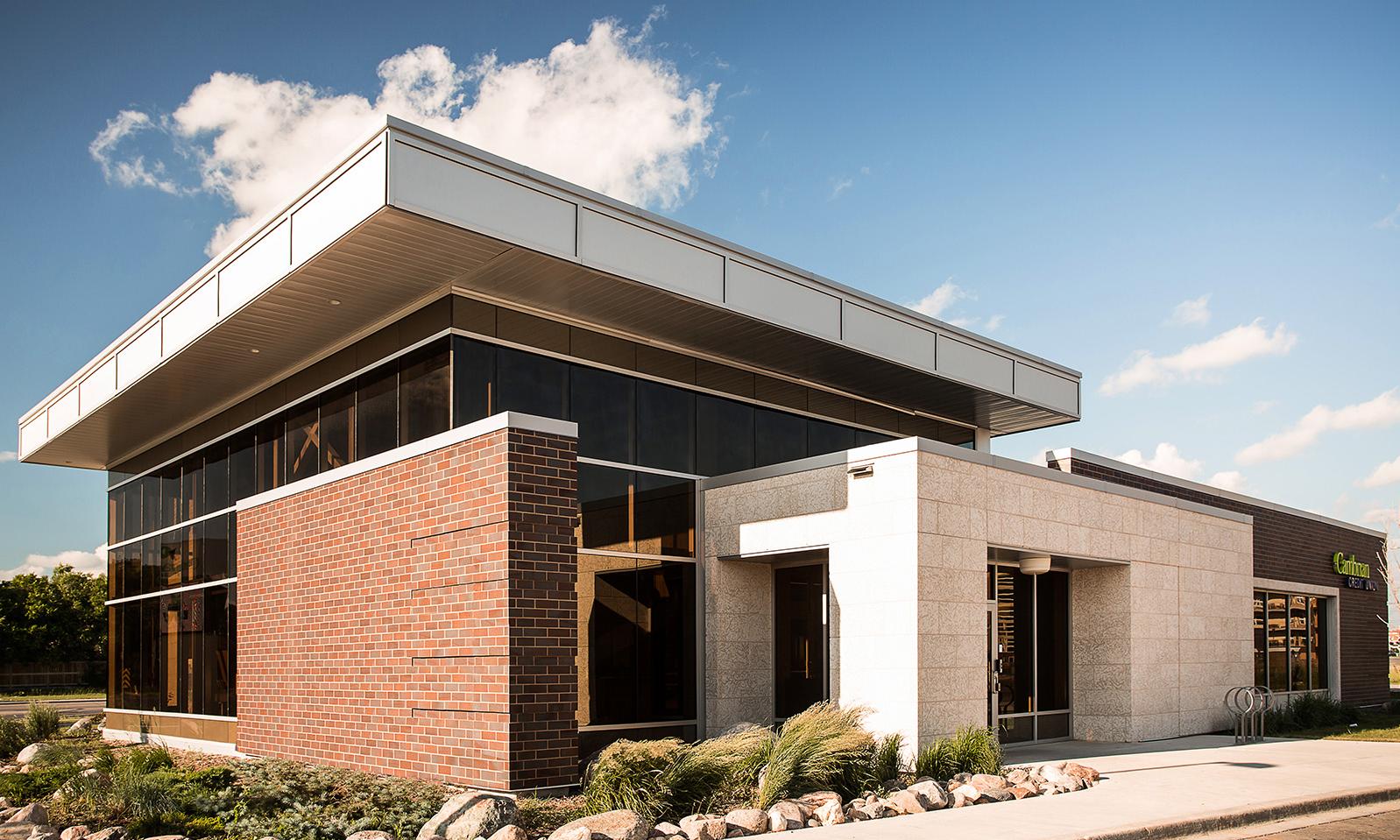 Cambrian Credit Union. Close up of the front of the building featuring the landscaping. 